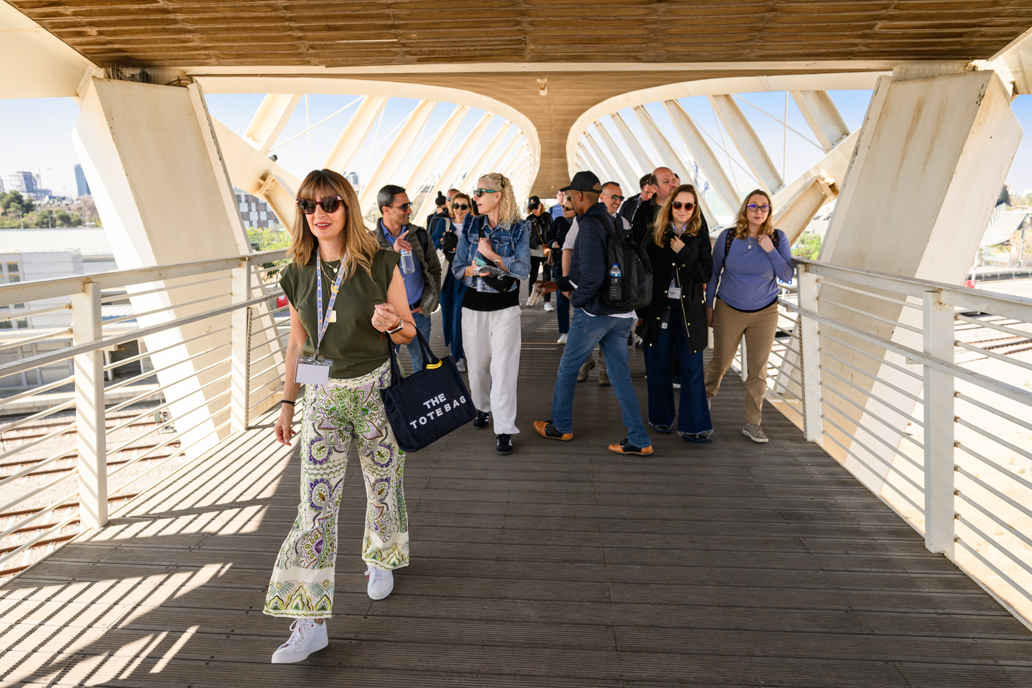 Halutz cohort 1 walk across the DNA bridge during their visit to the campus in Beer-Sheva