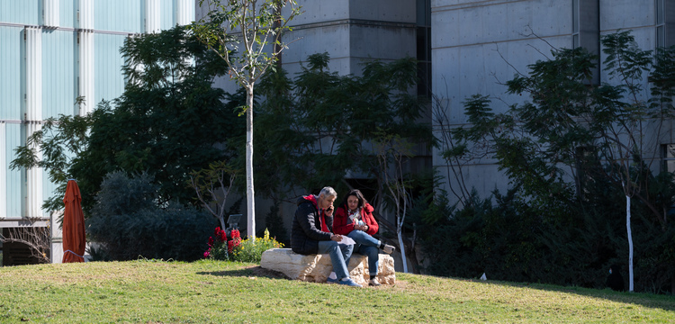 view of people relaxing in Guzik Plaza